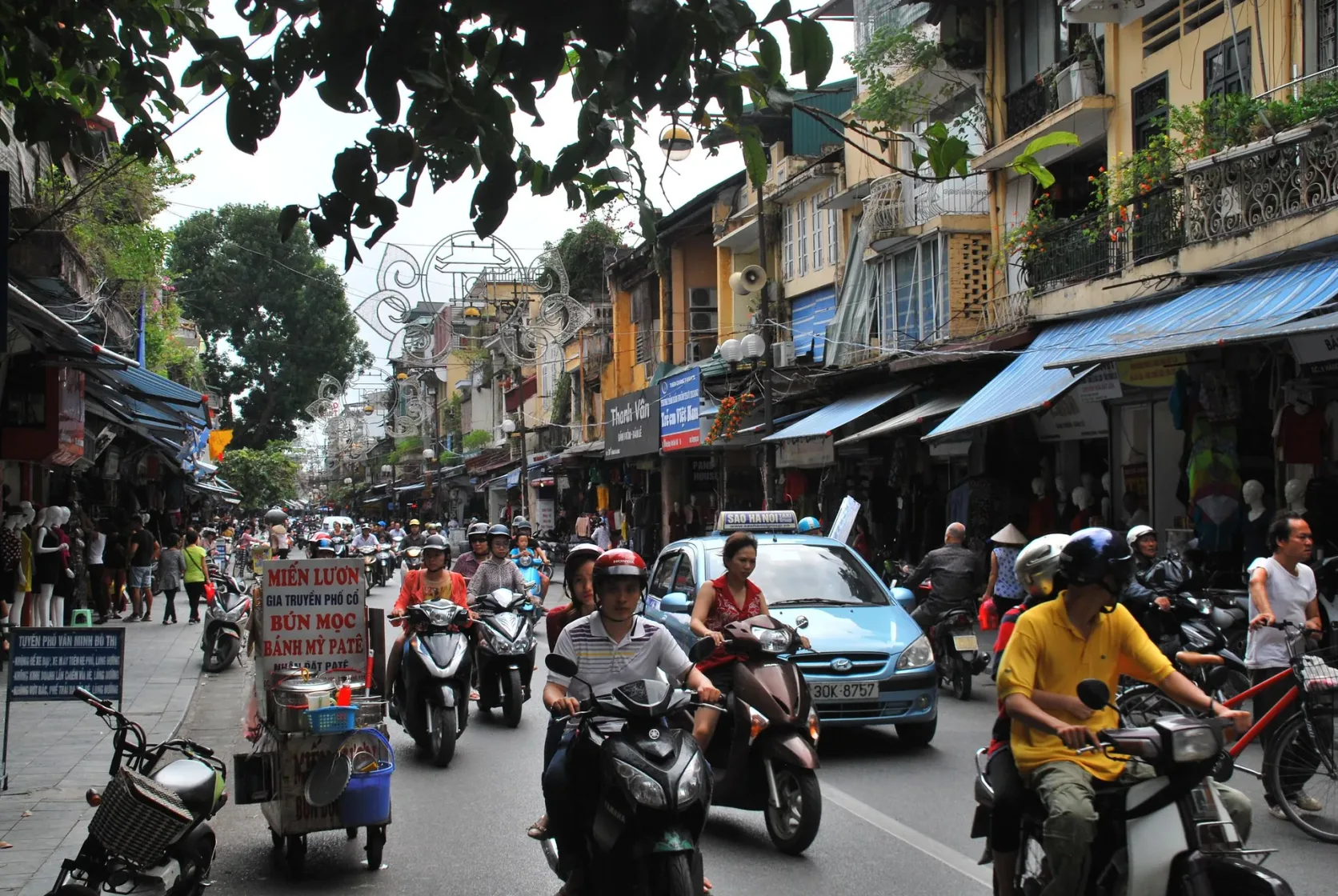 An Old Quarter street in Hanoi full of motorbikes.