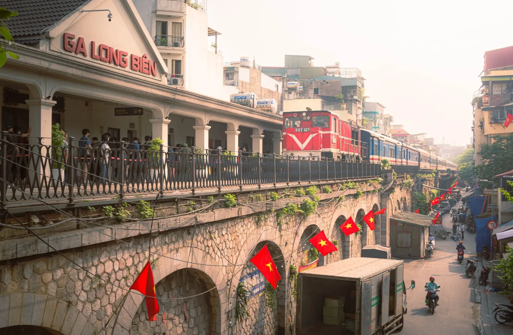 A train at Ga Long Biên on Hanoi's brick-arched railway viaduct.
