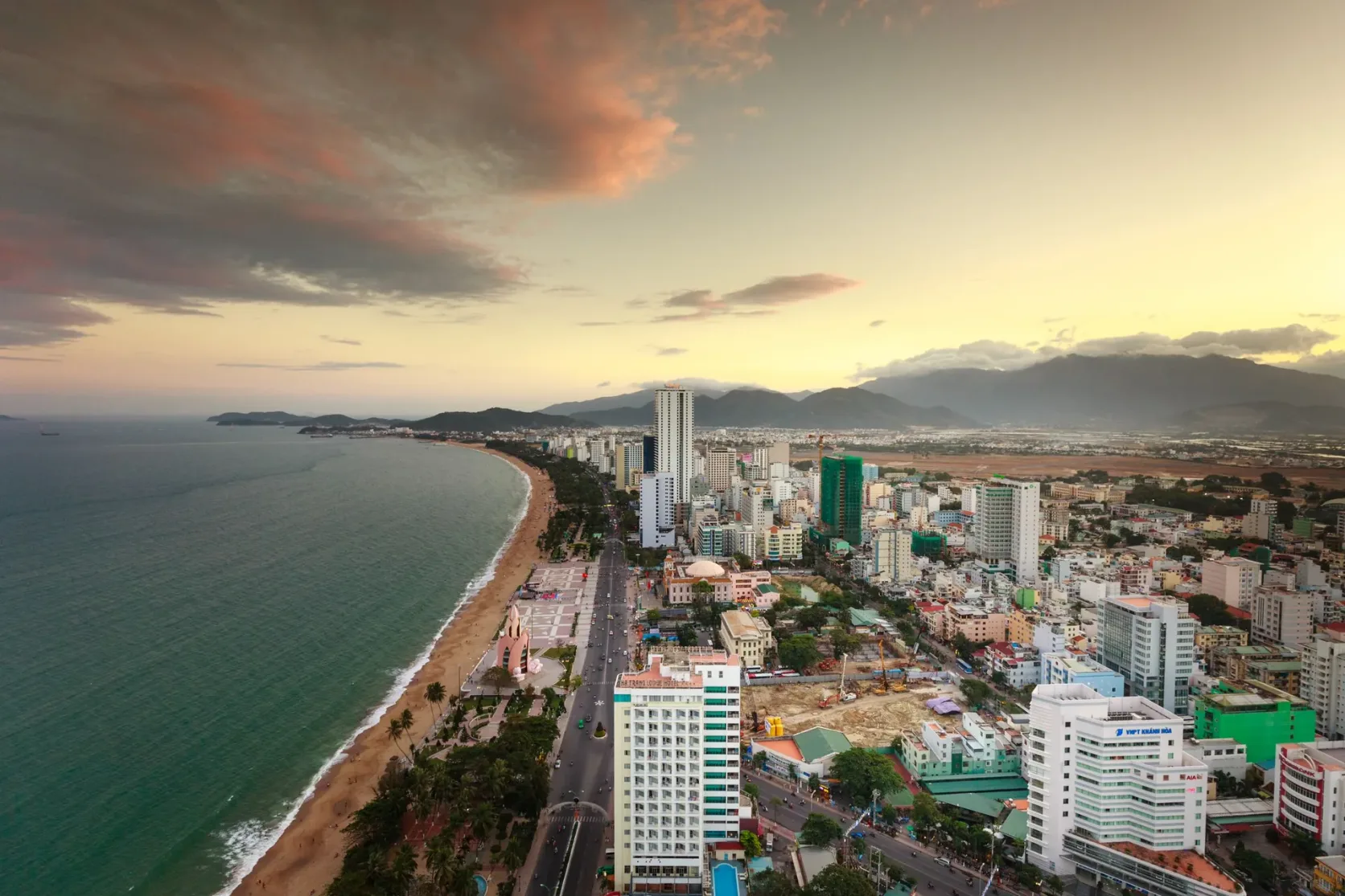 Nha Trang's beach and city beside the bay.